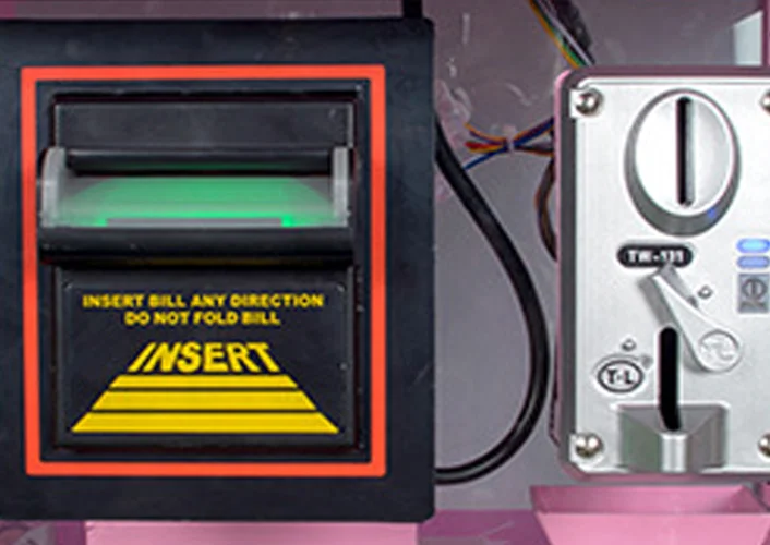 Claw machine components and service access