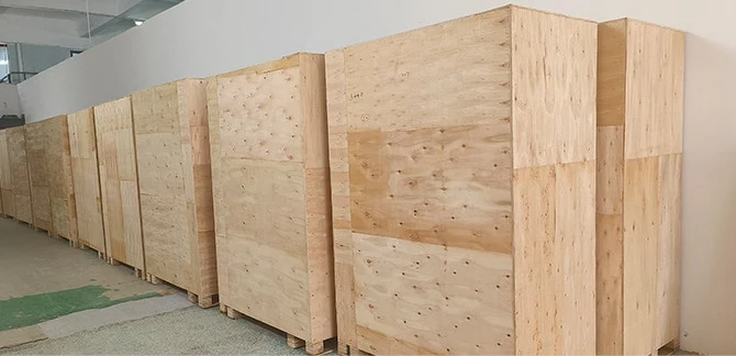 Closed wooden equipment crates in a partner packing reference