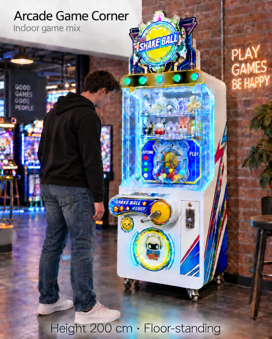 An adult visitor observes the 200cm Shake Ball cabinet in an arcade with a relaxed arm at his side and the original crank unobscured.